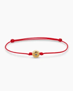 Evil Eye Cord Bracelet Red Nylon with 18K Yellow Gold and Sapphire, 7.7mm